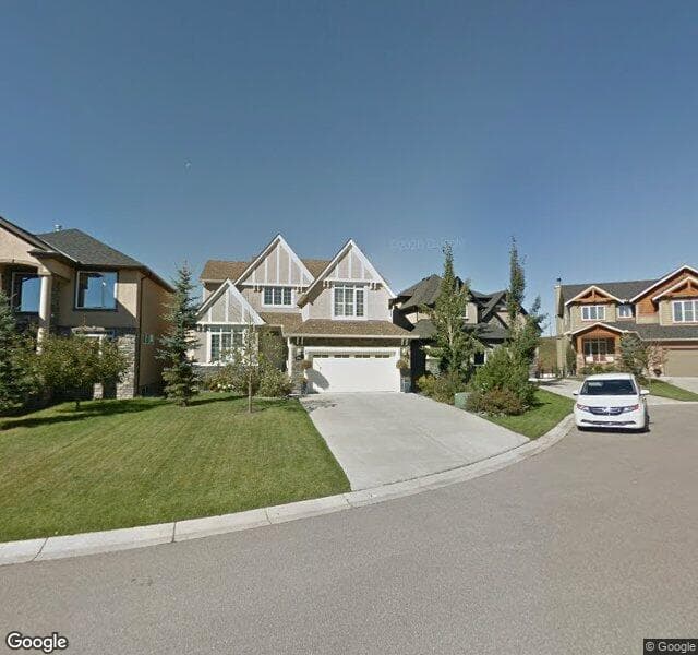 Street view of 242 Discovery Ridge Bay SW, Calgary