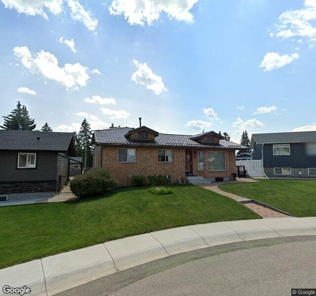 Street view of 1035 Riddell Place SE, Calgary