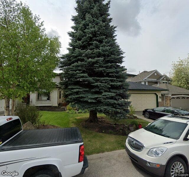 Street view of 123 Sunset Place SE, Calgary
