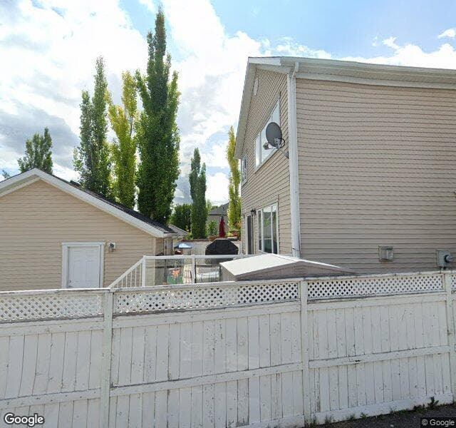 Street view of 245 Mike Ralph Way SW, Calgary
