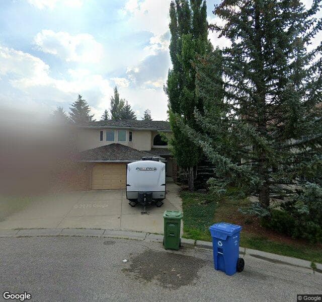 Street view of 511 Woodhaven Bay SW, Calgary