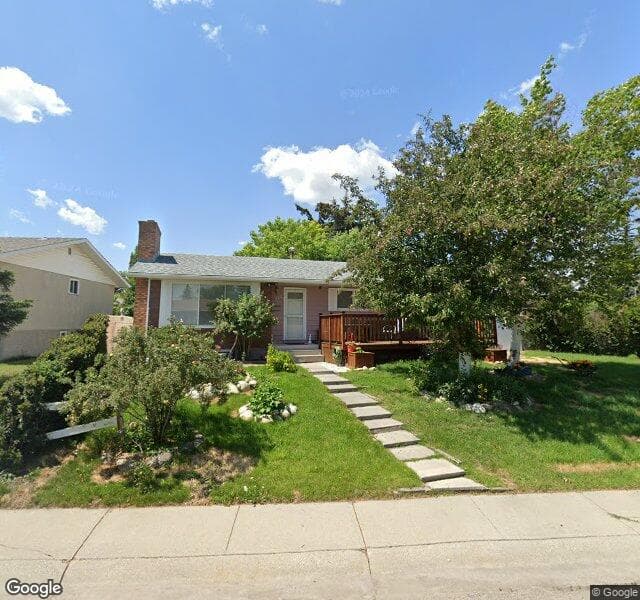 Street view of 923 Penmeadows Road SE, Calgary