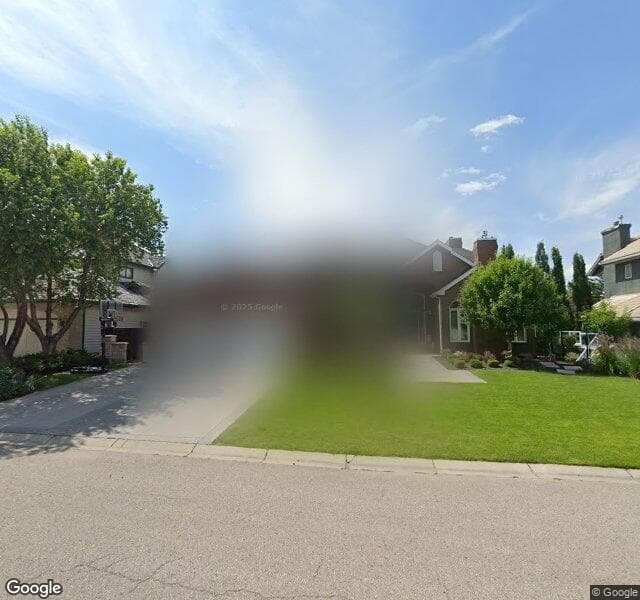 Street view of 151 Pumpmeadow Place SW, Calgary
