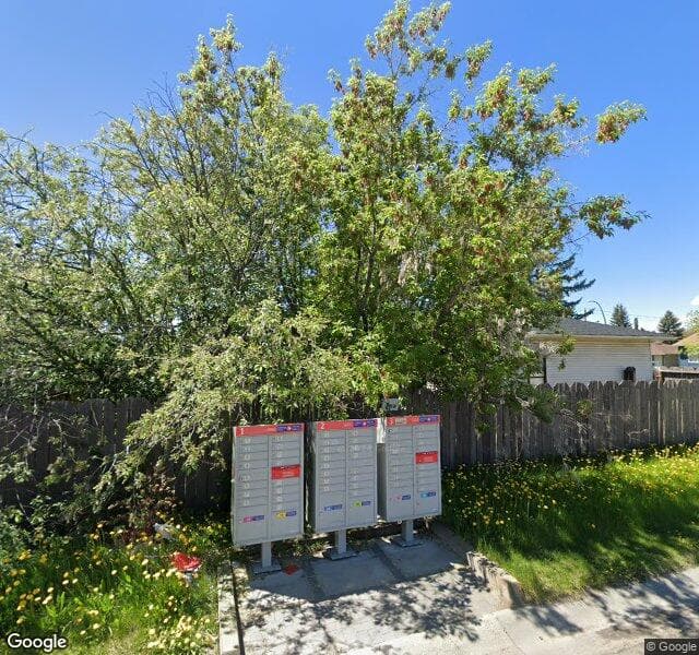 Street view of 1407 Falconridge Drive NE, Calgary