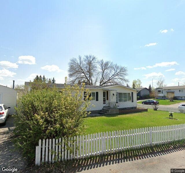 Street view of 208 Huntwell Court NE, Calgary