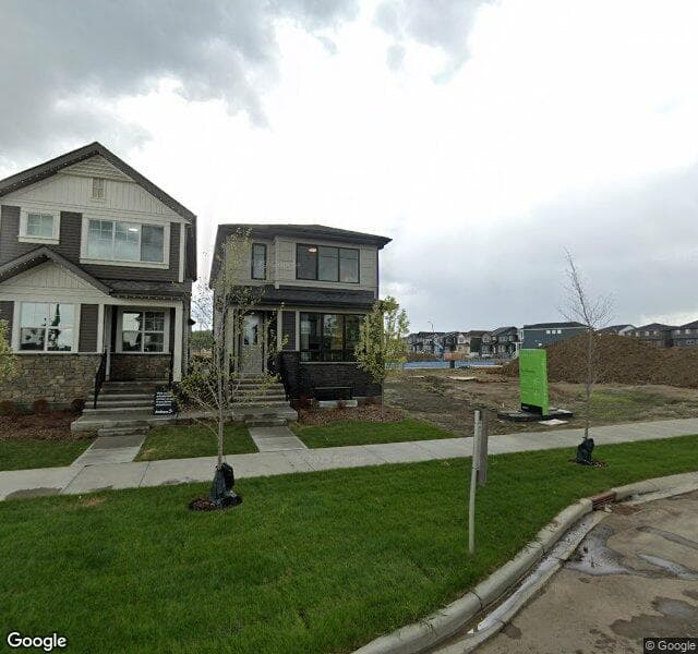 Street view of 822 Creekside Boulevard SW, Calgary