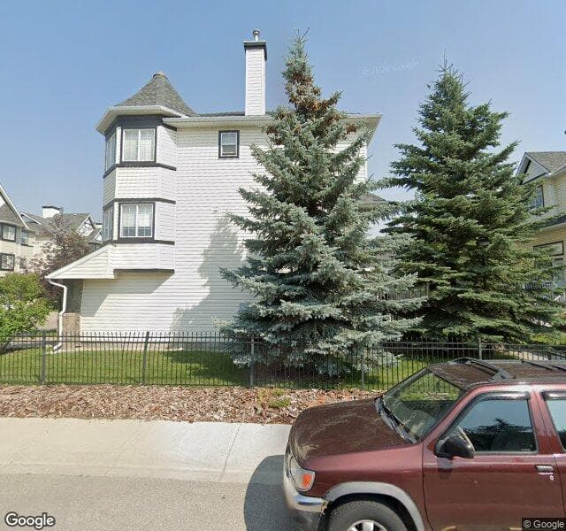 Street view of 65 Cougar Ridge Mews SW, Calgary