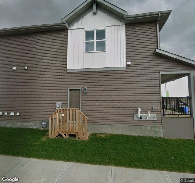Street view of 771 Creekside Boulevard SW, Calgary