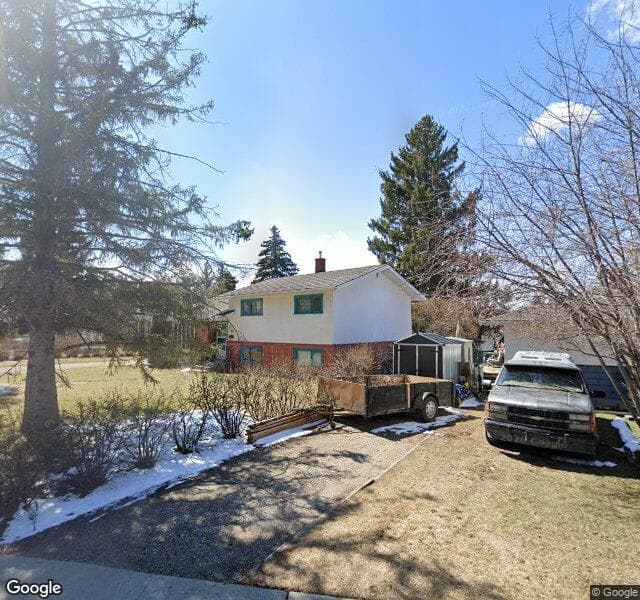 Street view of 65 Foxwell Road SE, Calgary