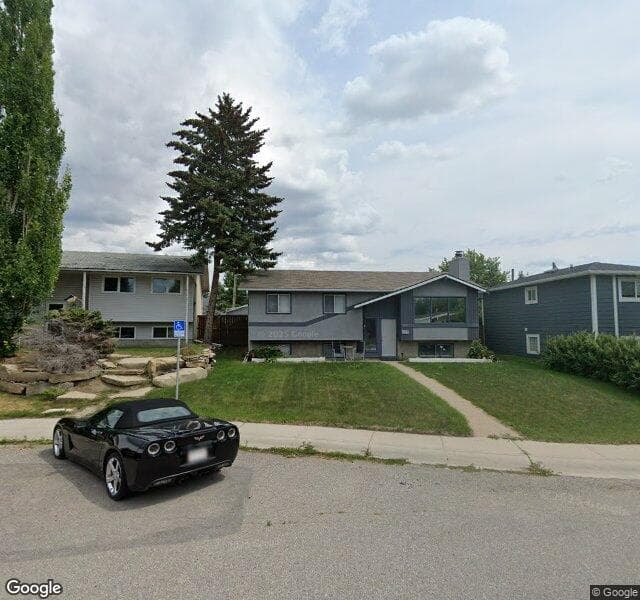 Street view of 1116 Lake Huron Crescent SE, Calgary