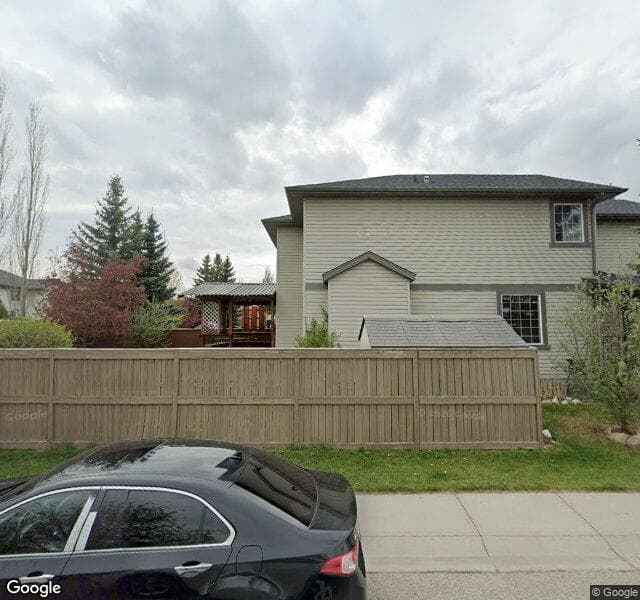 Street view of 411 Bridlewood Avenue SW, Calgary