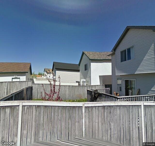 Street view of 130 Bridlewood Close SW, Calgary