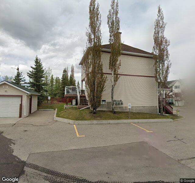 Street view of 6-15 Rocky Ridge Gate NW, Calgary