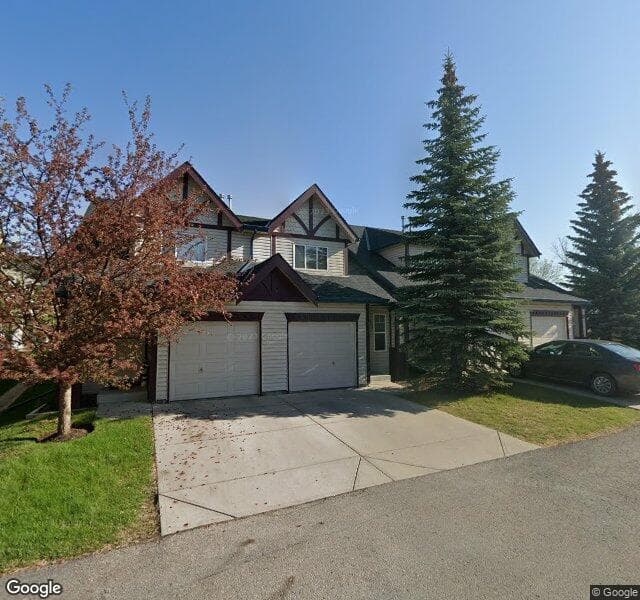 Street view of 220 Country Village Cape NE, Calgary
