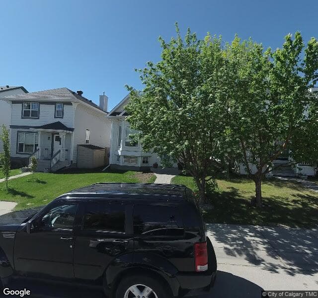 Street view of 165 Tuscany Drive NW, Calgary