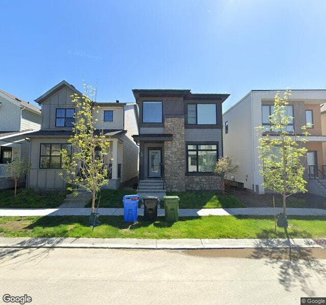 Street view of 40 Treeline Manor SW, Calgary