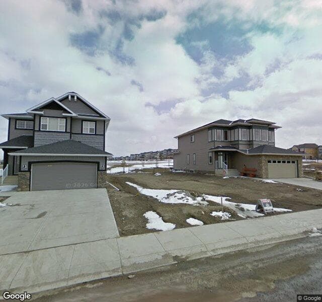 Street view of 1088 Panamount Boulevard NW, Calgary