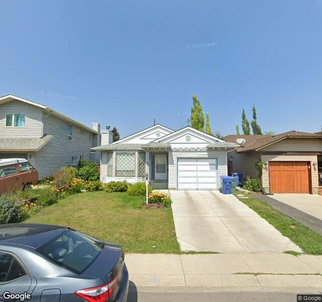 Street view of 100 Cedargrove Way SW, Calgary