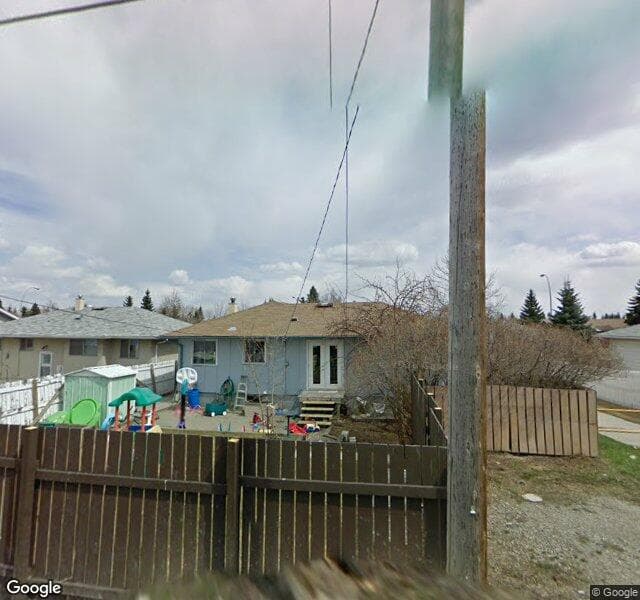Street view of 6103 Centre Street NW, Calgary