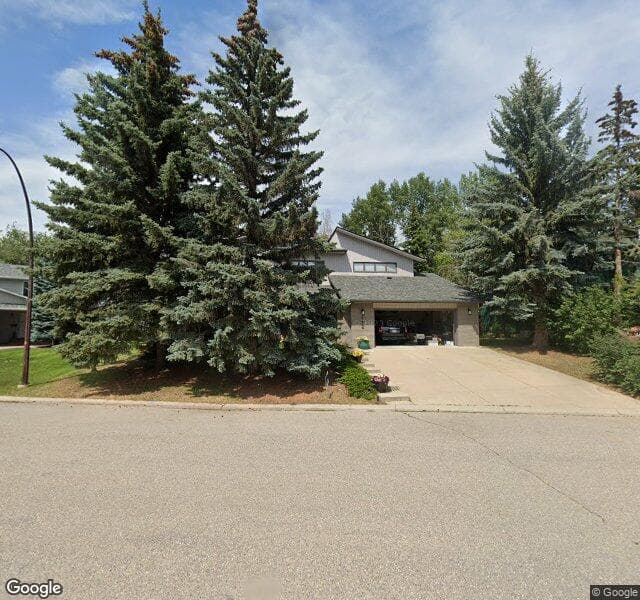 Street view of 112 Pump Hill Bay SW, Calgary