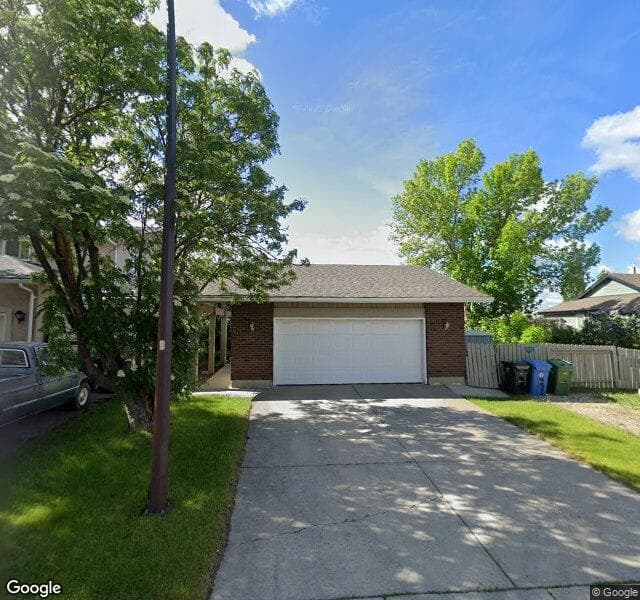 Street view of 8479 64 Avenue NW, Calgary