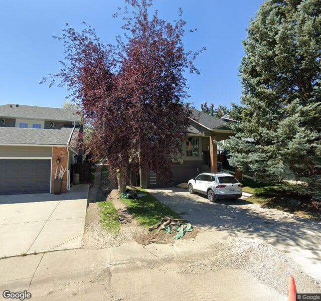 Street view of 119 Coachwood Crescent SW, Calgary