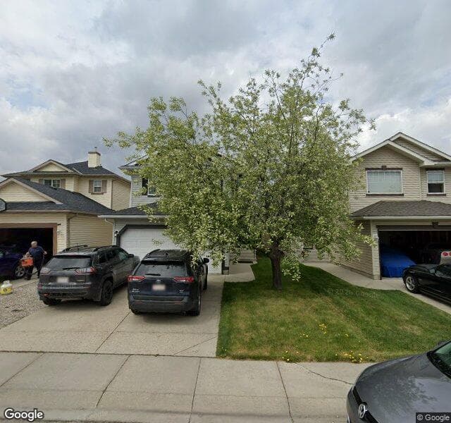 Street view of 1006 Bridlemeadows Manor SW, Calgary