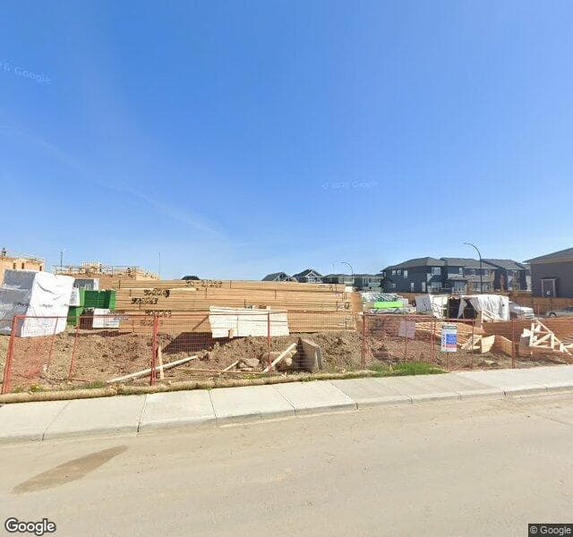 Street view of 26 Creekside Avenue SW, Calgary