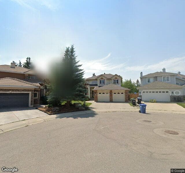 Street view of 160 Woodstock Way SW, Calgary