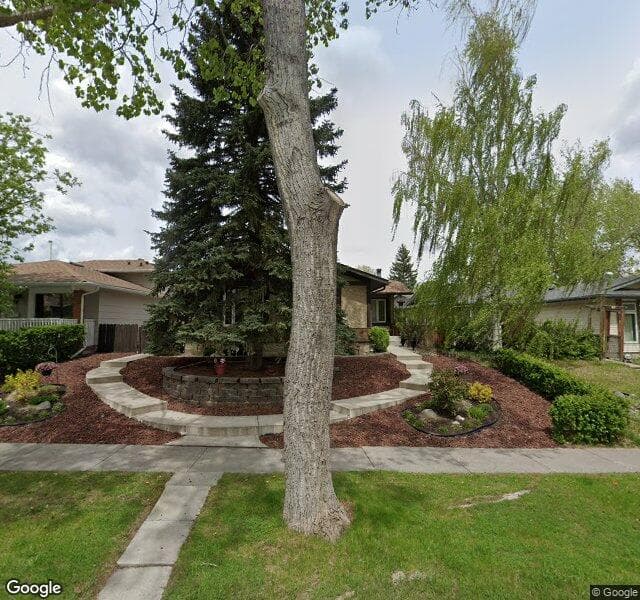Street view of 939 Midridge Drive SE, Calgary