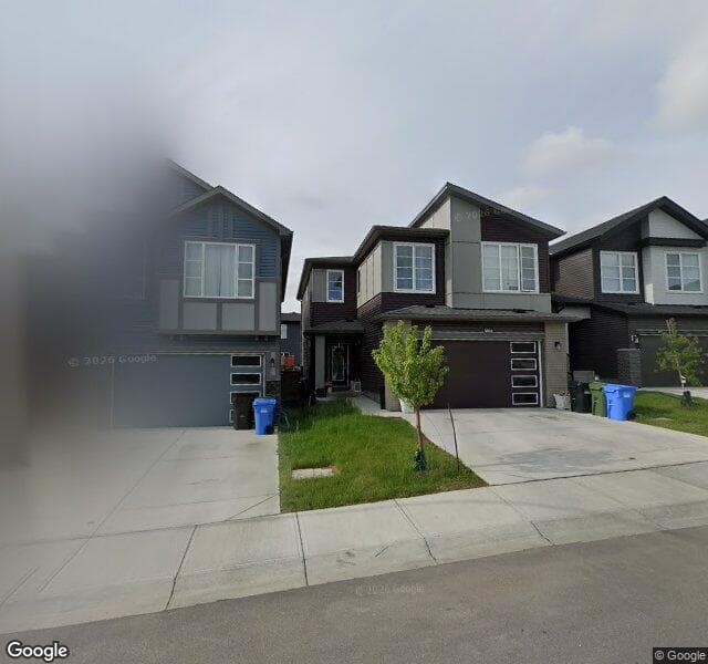 Street view of 128 Sage Bluff Manor NW, Calgary