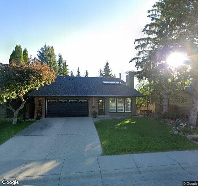 Street view of 828 Oakside Circle SW, Calgary