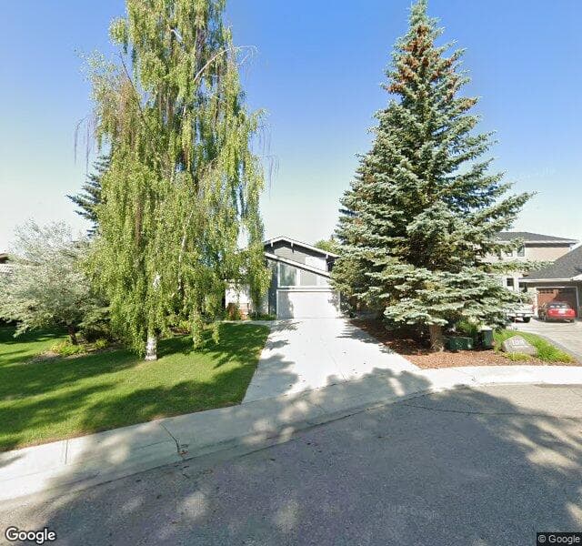 Street view of 12215 Lake Louise Way SE, Calgary