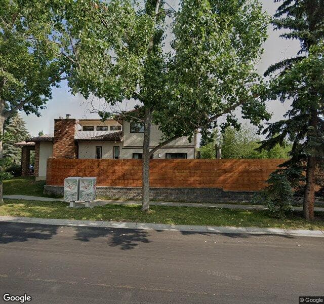 Street view of 4 Woodcroft Place SW, Calgary
