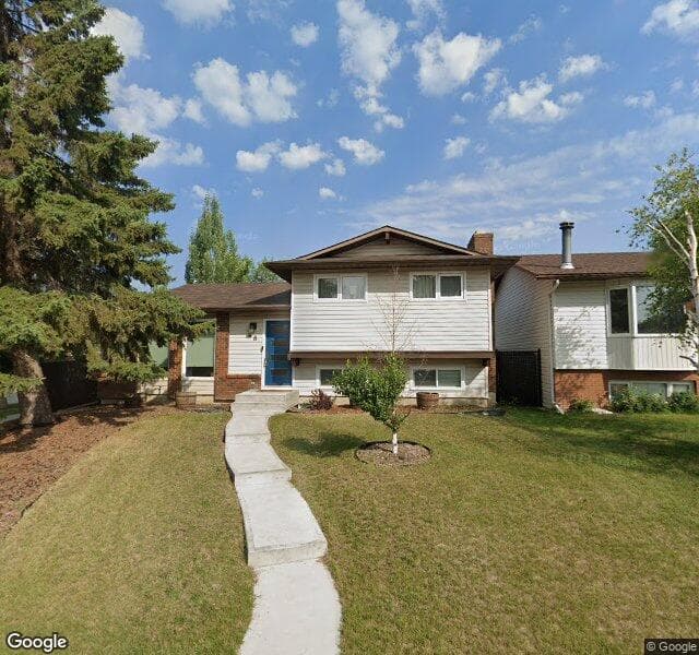 Street view of 48 Wood Oak Place SW, Calgary
