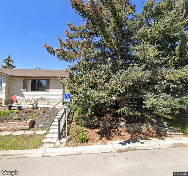 Street view of 85 Woodglen Way SW, Calgary