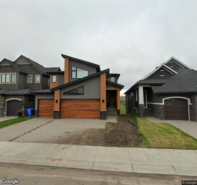 Street view of 61 Cranbrook Cape SE, Calgary