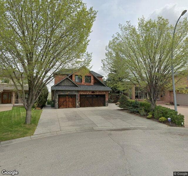 Street view of 21 Sunset Cove SE, Calgary