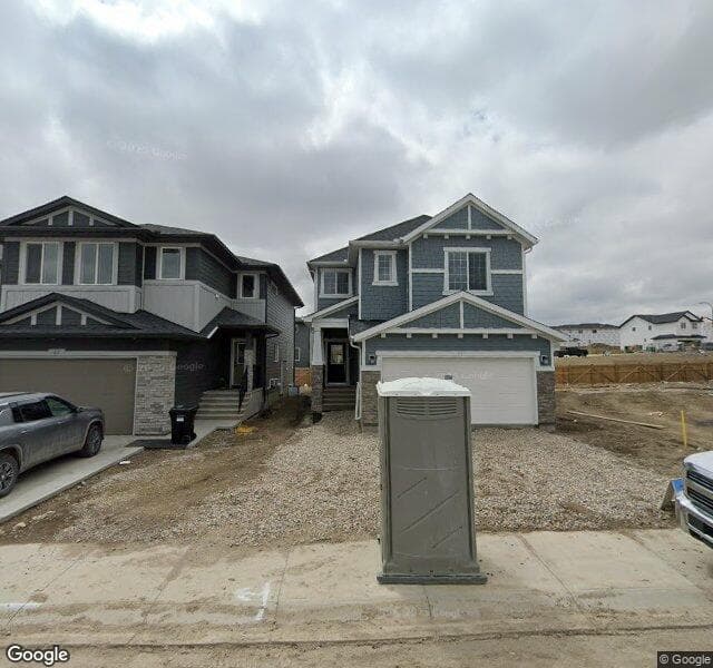 Street view of 65 Versant Point SW, Calgary