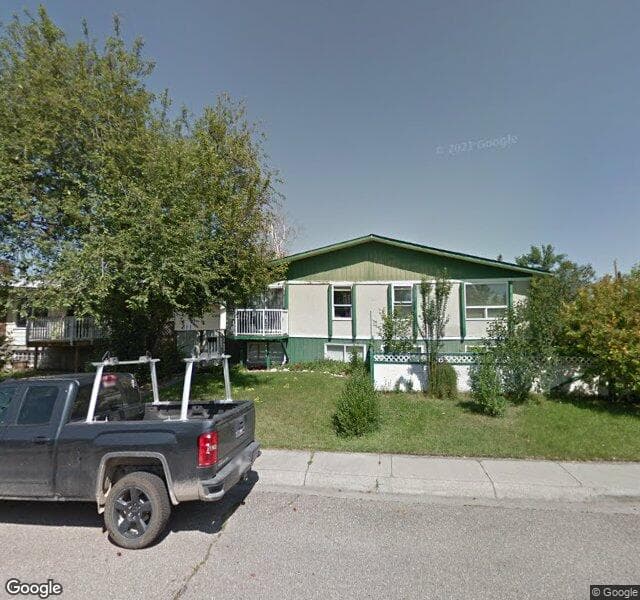 Street view of 73 Queen Isabella Close SE, Calgary