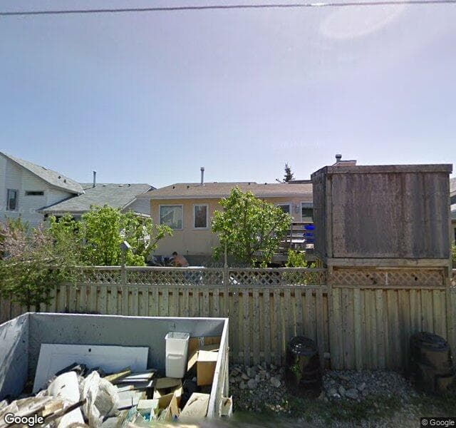 Street view of 121 Sundown Place SE, Calgary