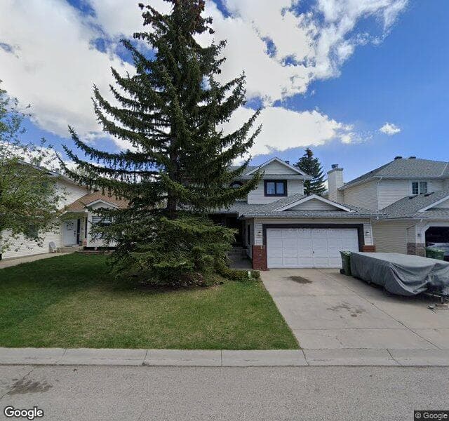 Street view of 56 Hawktree Green NW, Calgary
