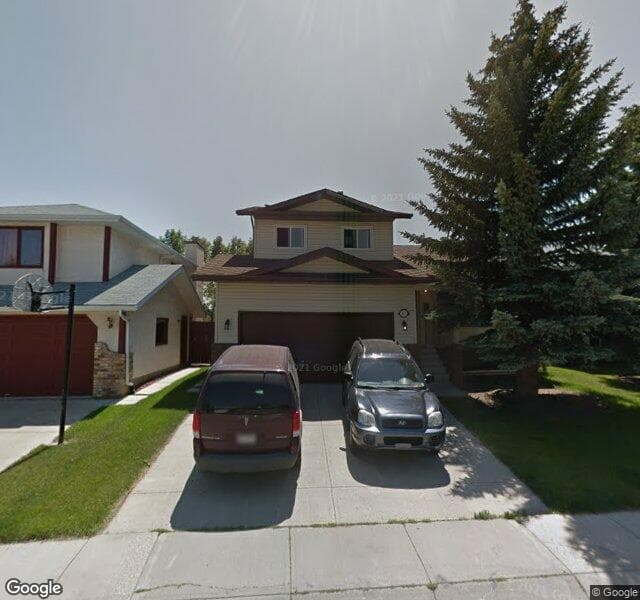 Street view of 72 Mckenna Manor SE, Calgary