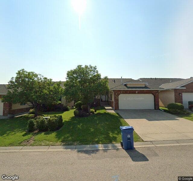 Street view of 70 Evergreen Bay SW, Calgary