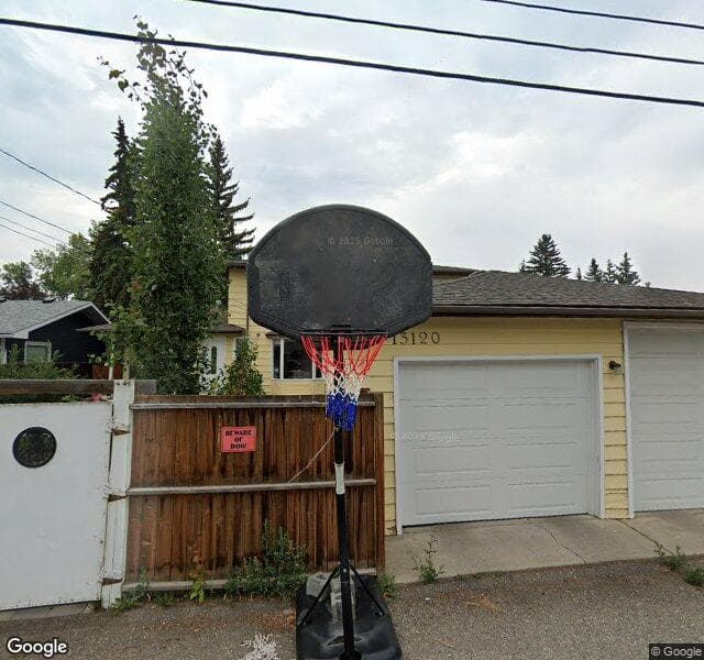 Street view of 13120 Lake Acadia Road SE, Calgary