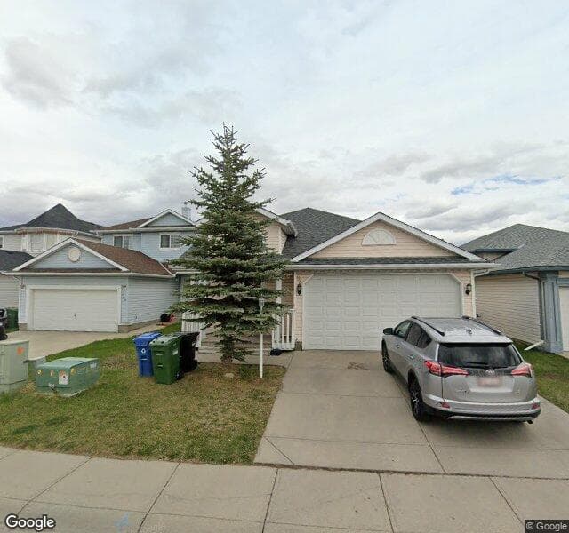 Street view of 98 Saratoga Close NE, Calgary