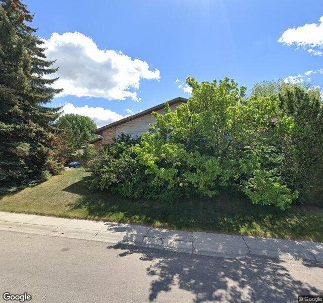 Street view of 303 Dalcastle Mews NW, Calgary