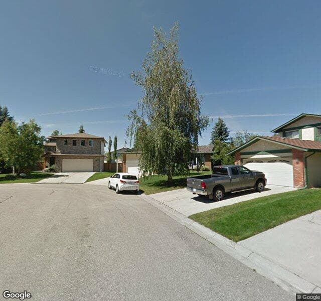 Street view of 48 Woodbrook Place SW, Calgary