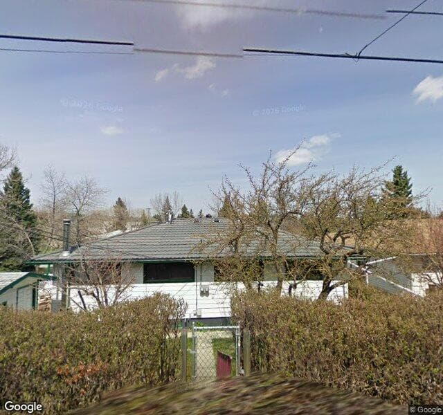 Street view of 1415 Rosehill Drive NW, Calgary