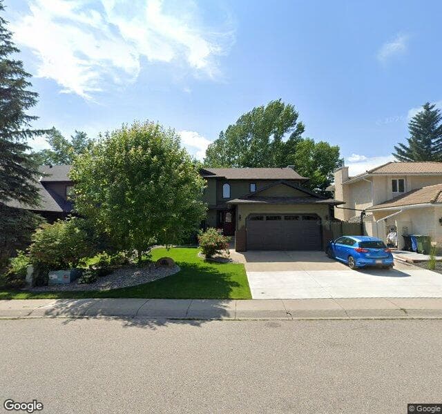 Street view of 118 Sunset Way SE, Calgary